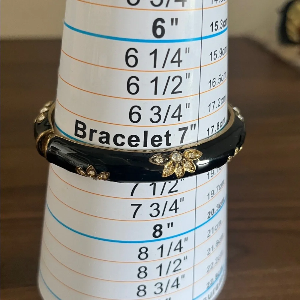 Hinged enamel bangle, size 7 1/4
